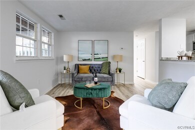 View of hardwood floored living room