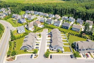 Aerial view of residential area with a heavily woo