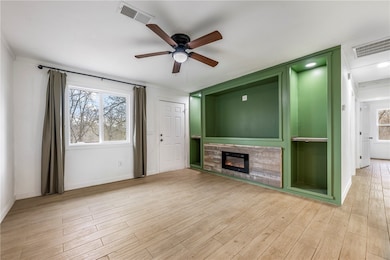 Electric fireplace serves as a cozy centerpiece, perfect for relaxing evenings