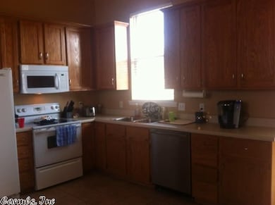 oak cabinets, vaulted ceiling, french door w/blind