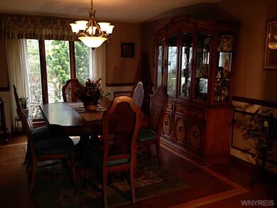 Dining Room Gleaming Solid oak floors with  inlay