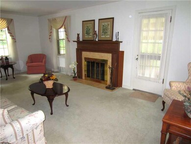 Living Room. A Wood Burning Fireplace, which has j