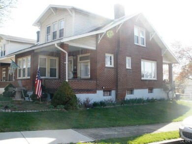 Side view of the this beautiful Brick home.