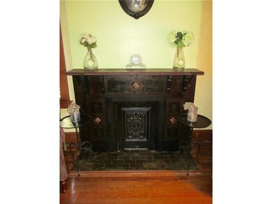 Stunning one of a kind marble fireplace.