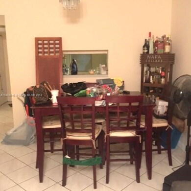 Dining area. Pass thru to kitchen.