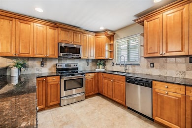 Stainless Steel Appliances, Granite Counter Tops and inset lighting