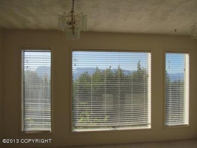 Living room with huge windows and view