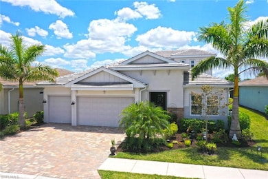 Traditional-style house with decorative driveway, 