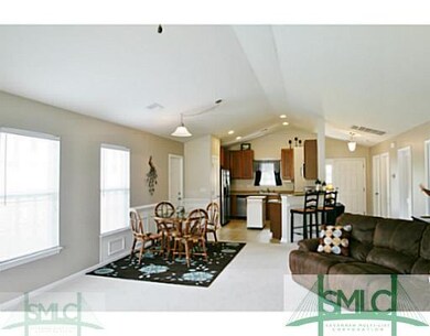 Den/Family/Great Room. Open to kitchen.