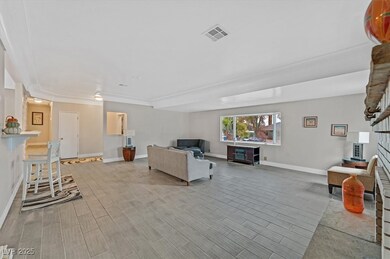 Living area featuring wood finish floors, visible