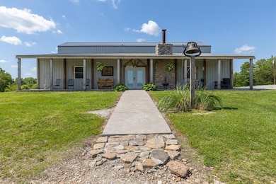 view of the full length covered porch overlooking