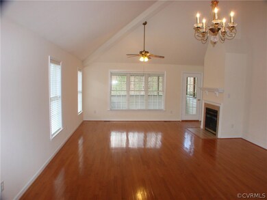 Gorgeous, open living room/dining area with hardwo