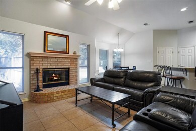 Tiled living room with a wealth of natural light, 