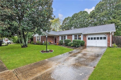 One car garage features a brand new garage door opener.