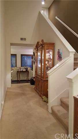 Top of the stairs looking east into the main livin