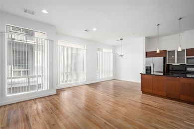 Spacious, well-lit, and airy living area enhanced