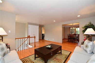 Living room flows into the dining room, kitchen ar