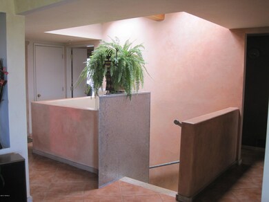 Stairwell to Lower Level w/Skylight