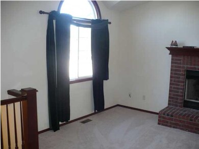 LIVING ROOM WITH NEW CARPET AND GREAT NATURAL LIGH