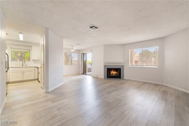 Unfurnished living room with a textured ceiling, p