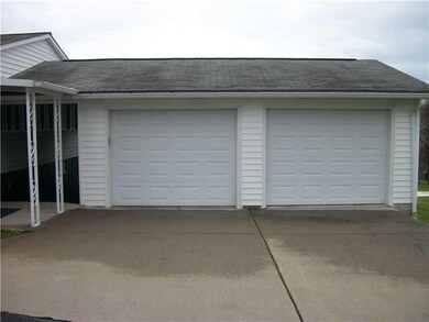 Parking Lot/Garage. 2 CAR ATTACHED GARAGE