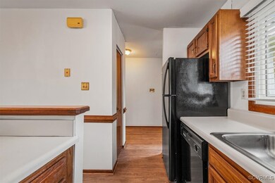 Kitchen featuring sink, light hardwood / wood-styl