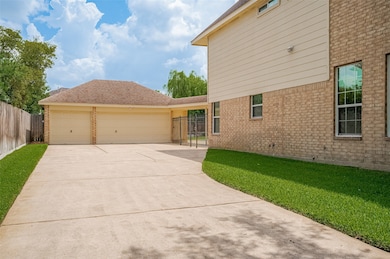 Convenient detached, three-car garage with ample d