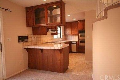 Kitchen opens up to dining area with convenient co
