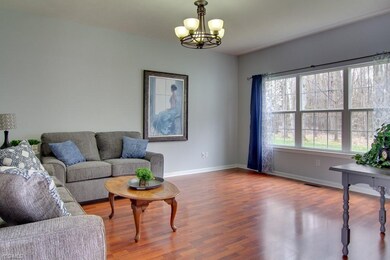 Large picture window with private wooded views