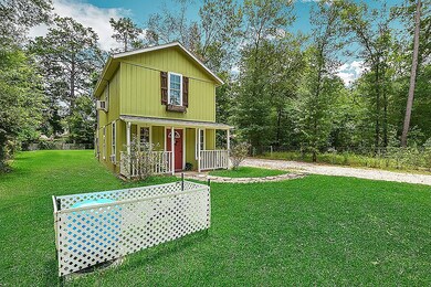 Surrounded by privacy with trees on both sides of the house.