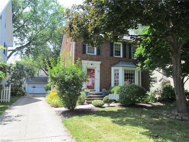 This gorgeous brick colonial boasts a newer roof w