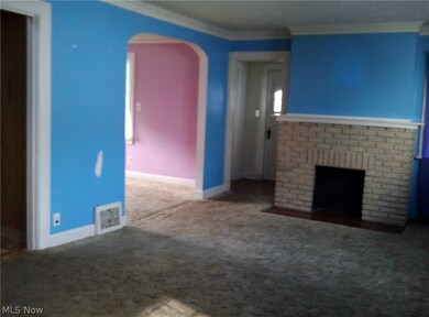 Living room with fireplace.