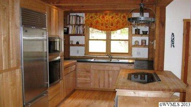 Great kitchen has upgraded appliances, concrete co