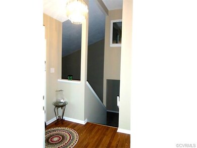 Foyer features a gorgeous chandelier and wonderful