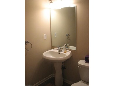Half bath off foyer on first floor.