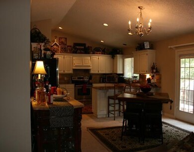 Kitchen. ANOTHER VIEW OF DINING AREA AND KITCHEN.