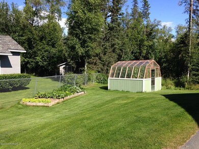 Greenhouse and raised-bed garden