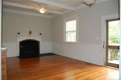 LIVING ROOM WITH HARDWOOD FLOORS, GAS FIREPLACE AN