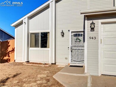 View of exterior entry featuring a garage