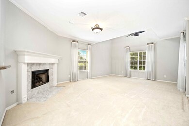 The already High Ceiling with Crown Molding opens