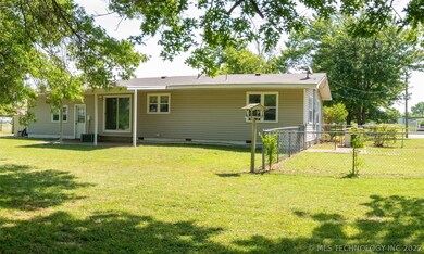 Back yard is fenced plus an extra fenced in area f