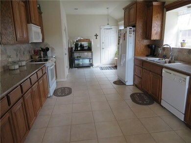 Large galley style kitchen, plenty of room for ent