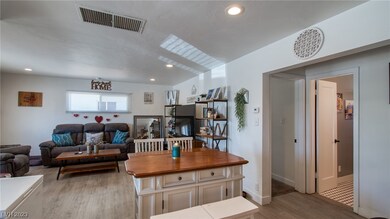 Living room, door way on right leads to guest bedr