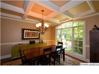 Coffered ceiling in formal dining room and plenty 