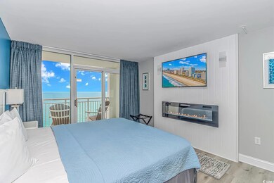 Bedroom featuring baseboards, access to exterior, 
