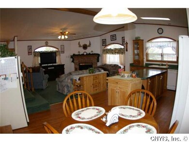 Kitchen. Lots of windows = s lots of light plus at