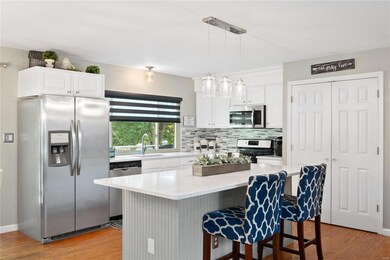 Quartz counters, huge island & SS appliances!