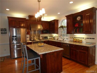 Gourmet kitchen just updated in 2012 has a commerc