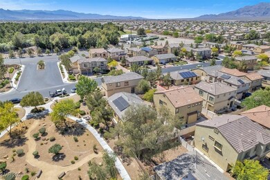 Aerial view of residential area featuring mountain