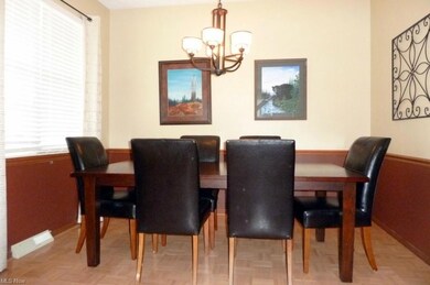 The beautiful dining room features hardwood floors